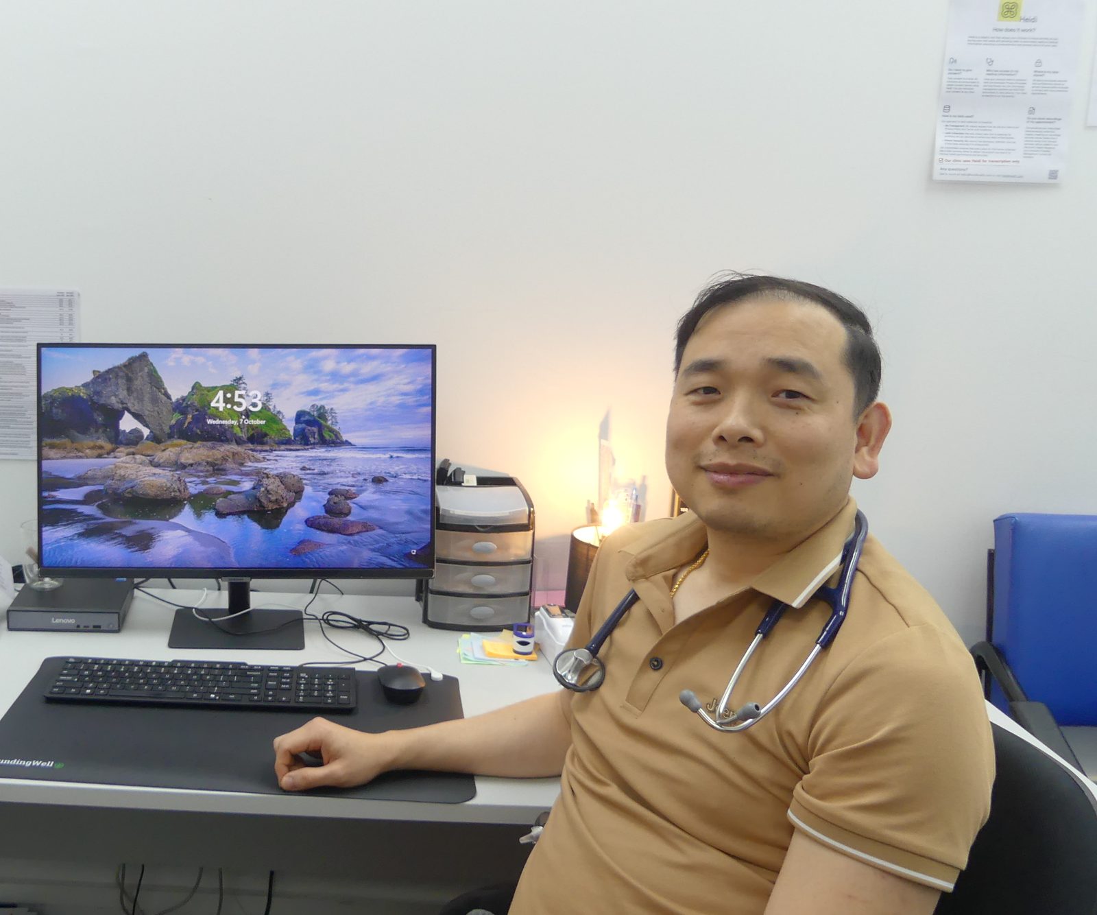 Dr Kouch at his desk