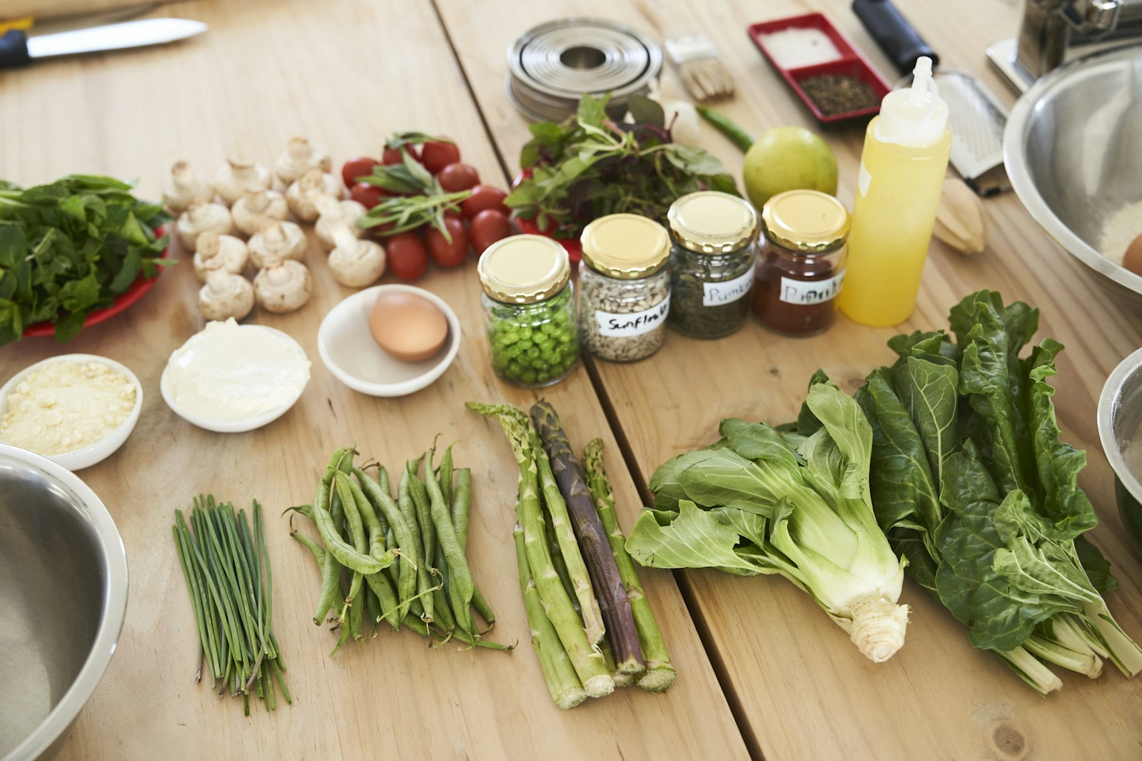 Fresh green vegetables on a wooden table