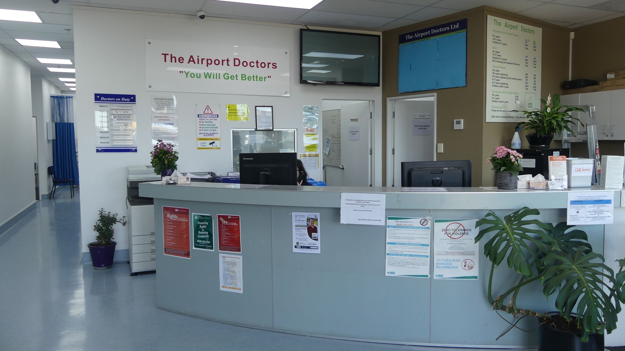 Our reception desk under the You Will Get Better sign